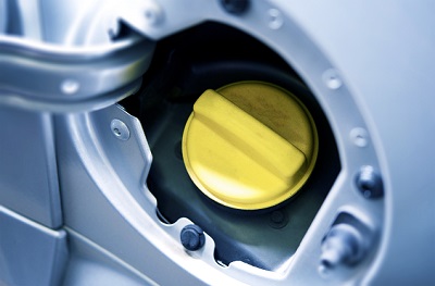 Yellow Cup of Car Fuel Inlet. Gas and Fueling Photo Concept.